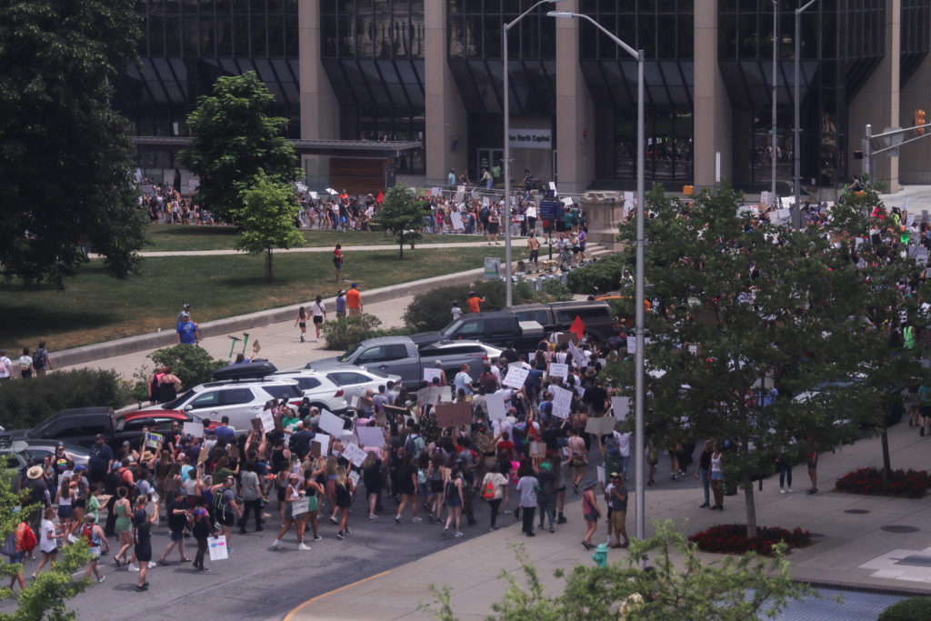 A crowd of protesters in a street